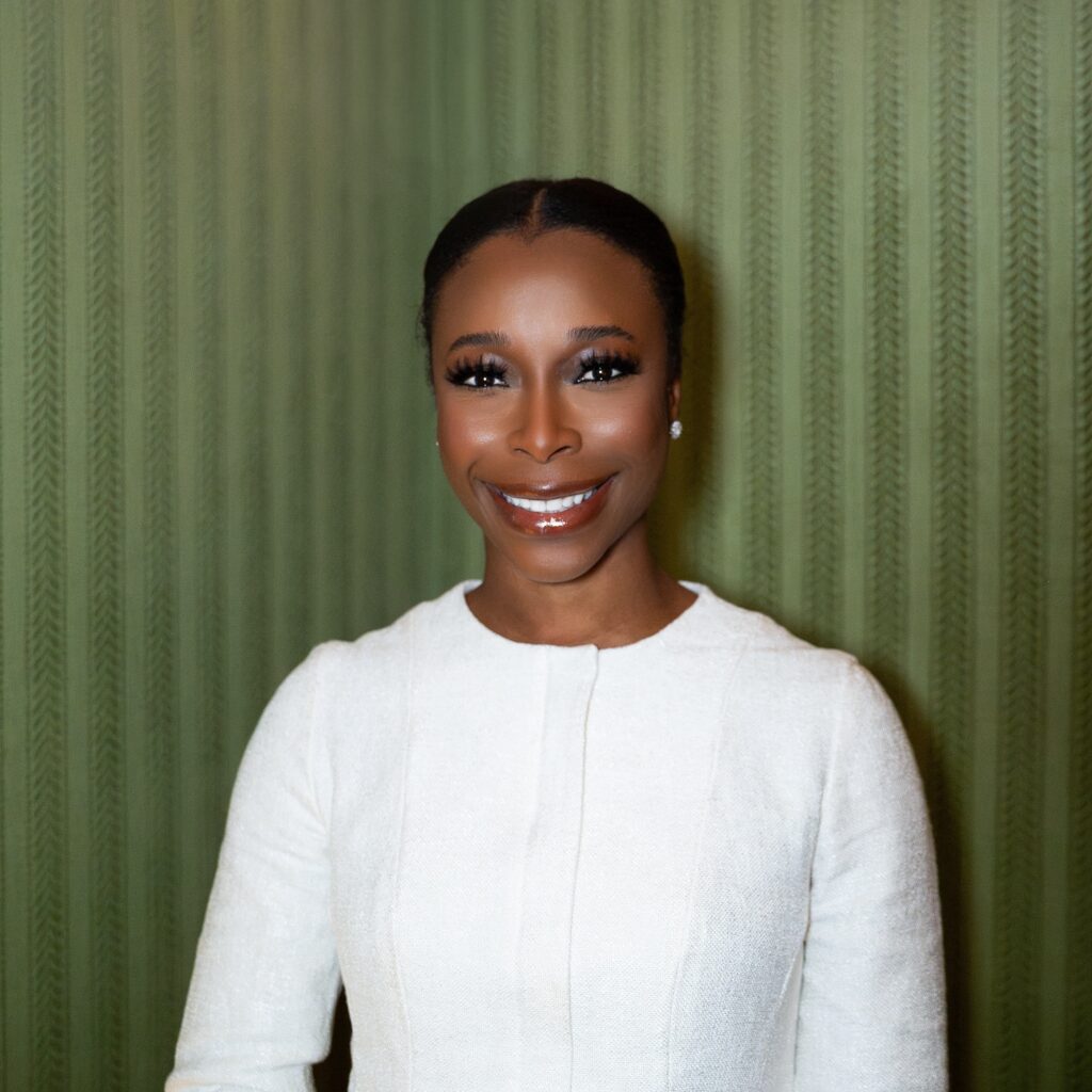 Vice President Carmen Ohen Vice President Carmen Ohen, a woman in a textured white jacket, smiles with bright makeup.